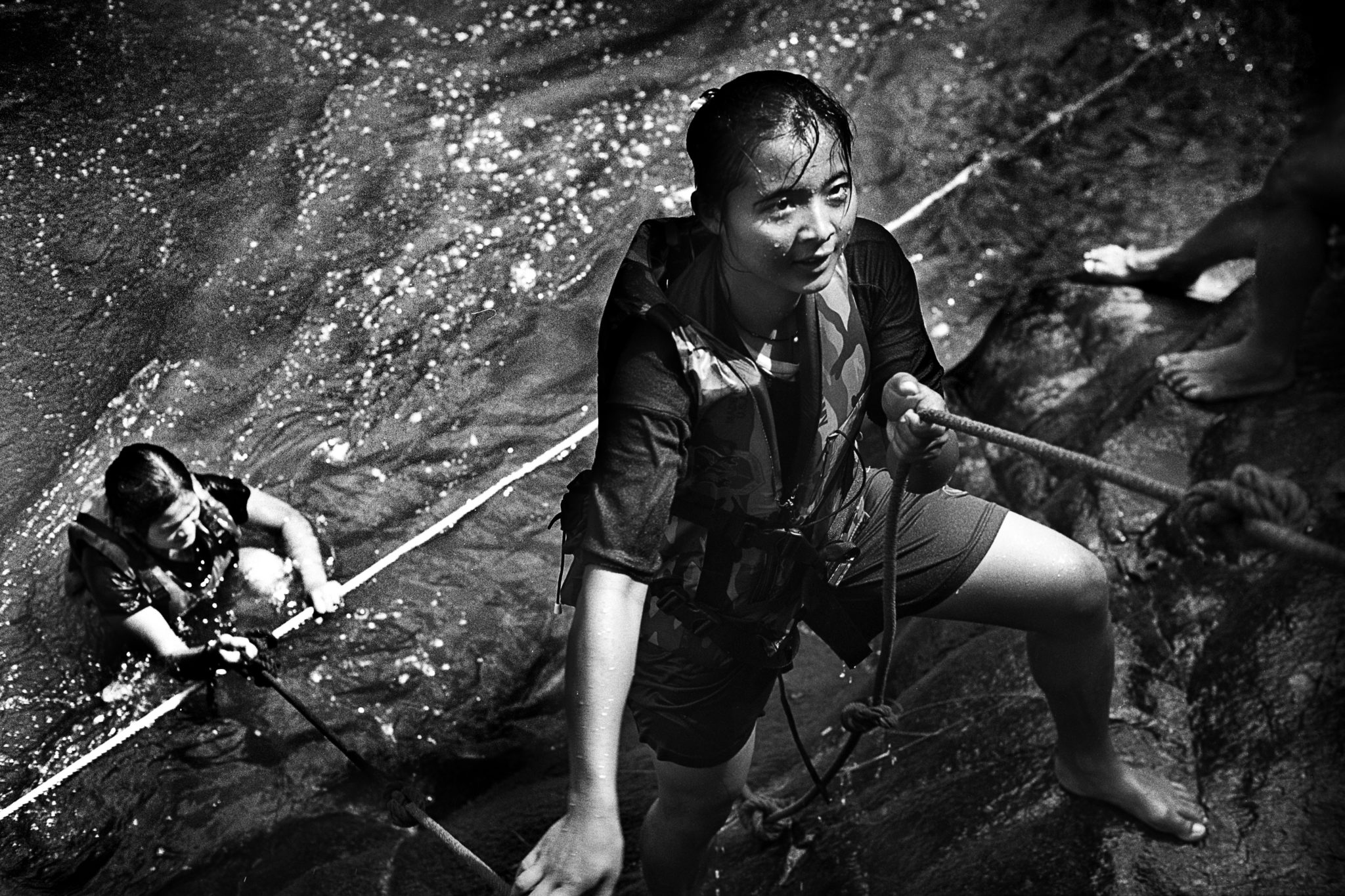 Tee Ser Paw learns to swim and repell as part of the survival training on a Saturday. Weekends are devoted to activities outside the camp. 
The Free Burma Rangers (FBR) is a multi-ethnic humanitarian service movement. They bring medical assistance and try to help people in the war zones of Burma. People from the KNLA (Karen National Liberation Army) as well as simple villagers get medical and assistance training. When the education is finished they form teams who are sent to the areas under attack to provide emergency medical care, shelter, food, clothing and human rights documentation. The teams also operate a communication and information network inside Burma that provides real time information from areas under attack. Together with other groups, the teams work to serve people in need.